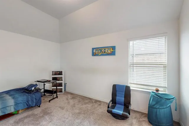 a room with furniture and a window