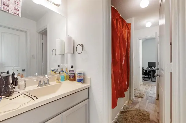 a en suite bathroom with a sink double vanity