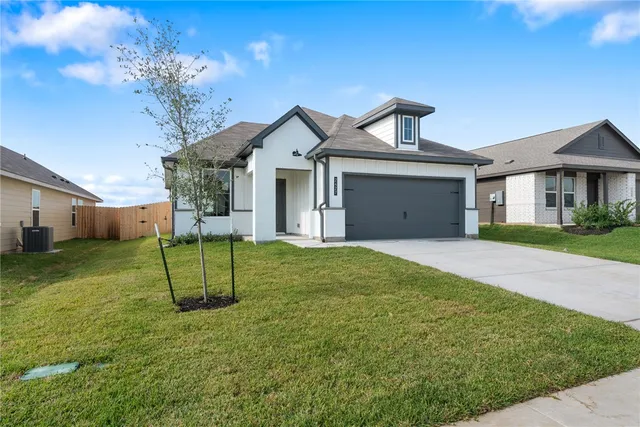 a view of outdoor space yard and front view of a house