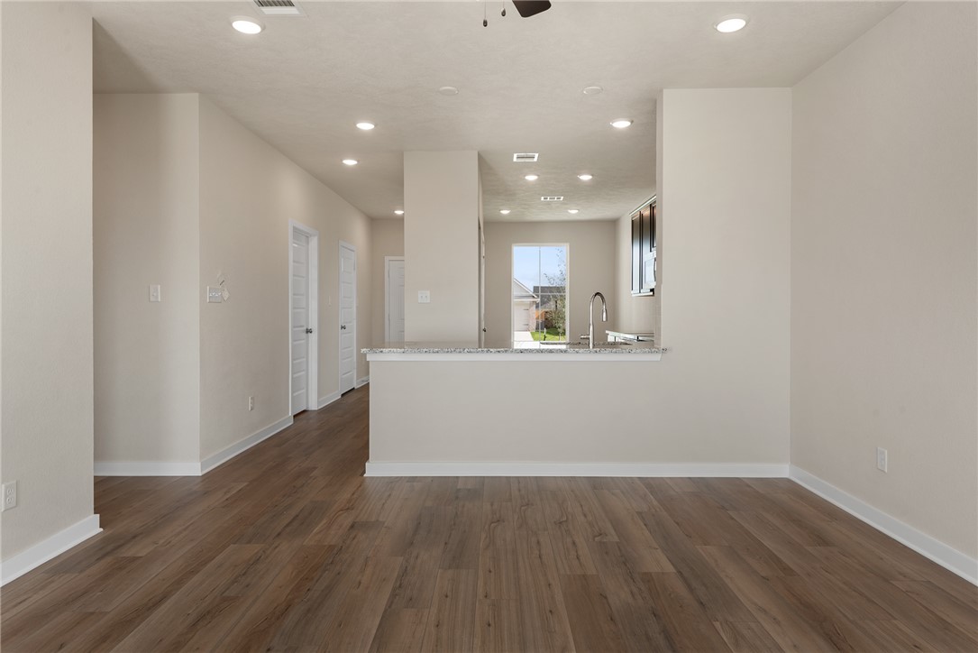 2427 Rooke Road Bryan, TX 77807 - Photo 20 of 38 a view of an empty room and wooden floor
