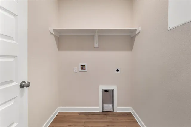 a view of small space with wooden floor