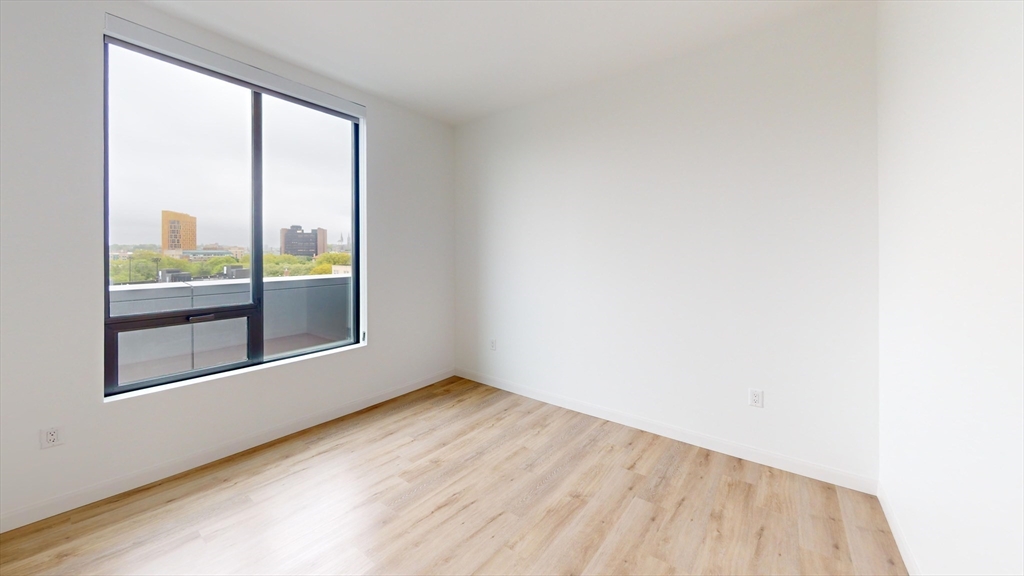 60 Kilmarnock Street, Unit 842 Boston, MA 02215 - Photo 9 of 13 a view of an empty room with a window