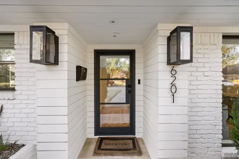 a bathroom with a mirror