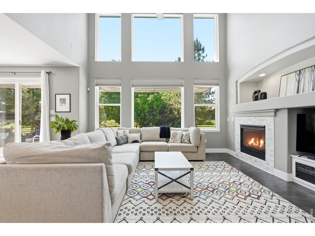 11725 Pleasant Hill Road Longmont, CO 80504 - Photo 9 of 50 The expansive living room, with soaring windows