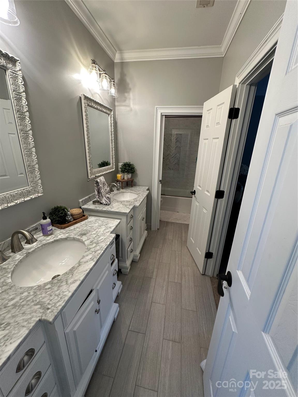 19622 River Falls Drive Davidson, NC 28036 - Photo 11 of 25 a bathroom with a granite countertop double vanity sink and mirror