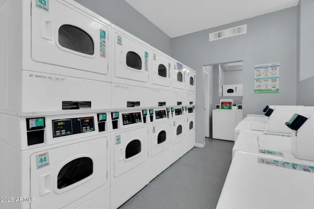 a view of a swimming pool with a yard