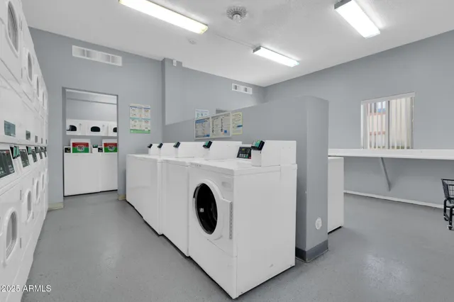 a view of kitchen with washer and dryer