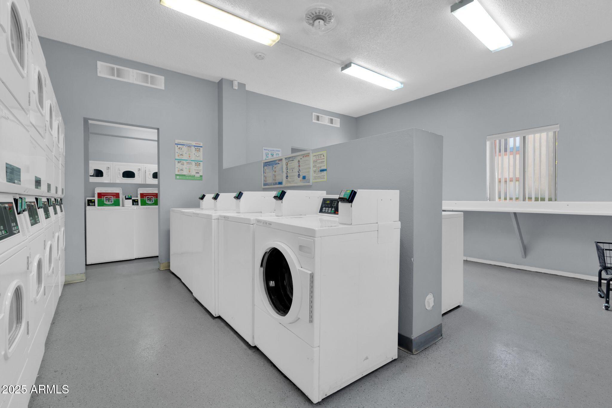 1440 North Idaho Road, Unit 2060 Apache Junction, AZ 85119 - Photo 22 of 24 a utility room with dryer and washer