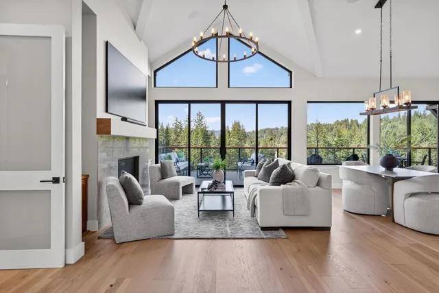 a kitchen with stainless steel appliances a sink stove and cabinets