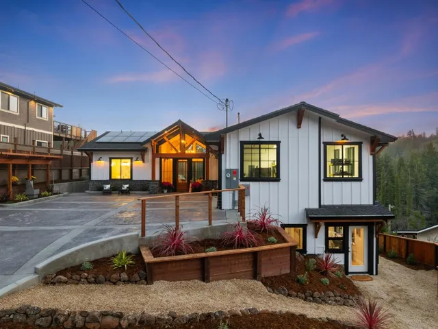 a front view of a house with entertaining space