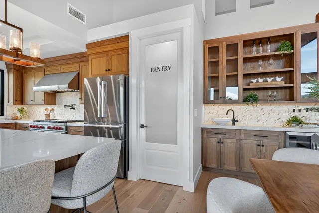 a bathroom with a sink double vanity and a mirror