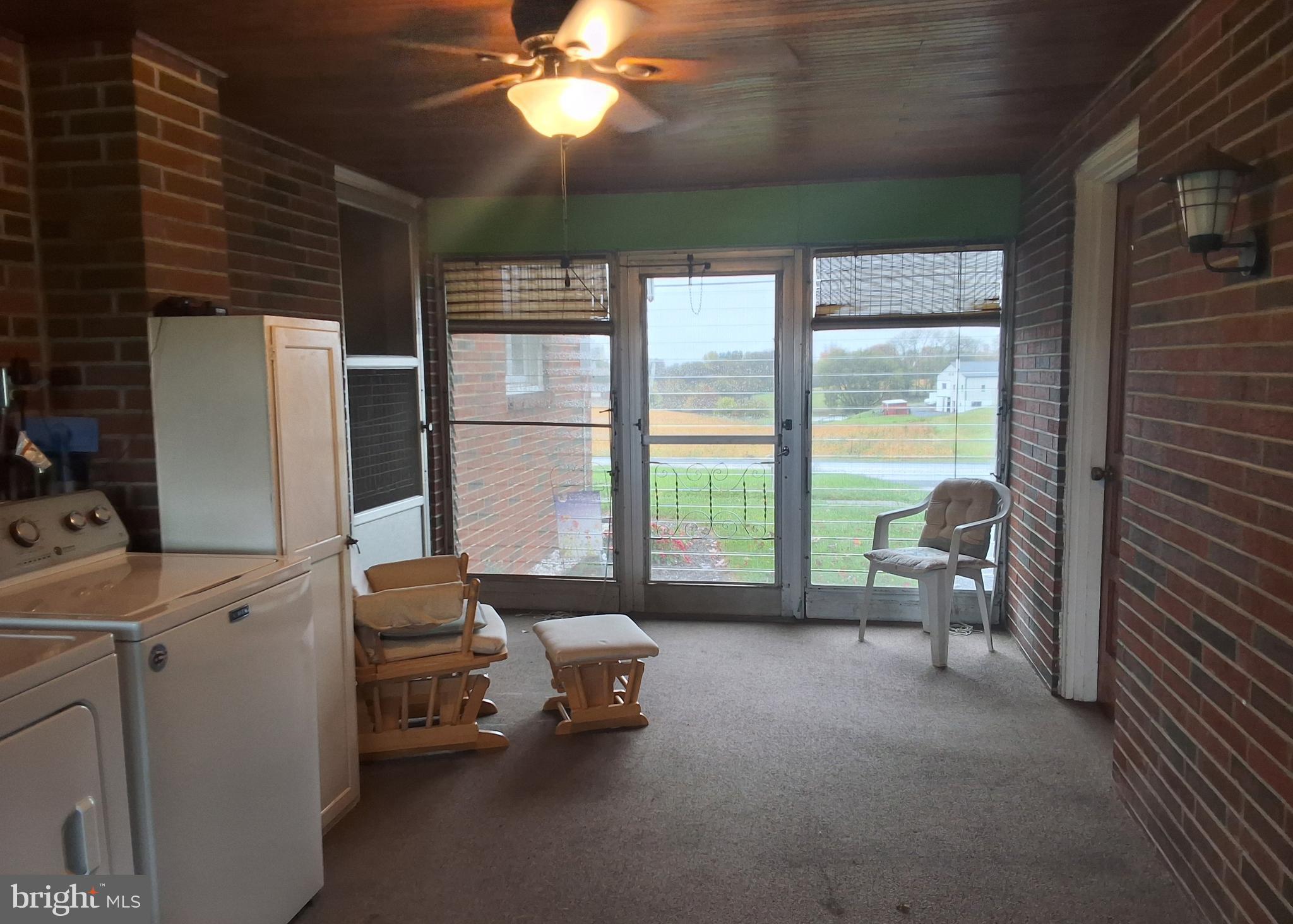 130 Fairland Road Lititz, PA 17543 - Photo 16 of 22 a living room with furniture and a floor to ceiling window