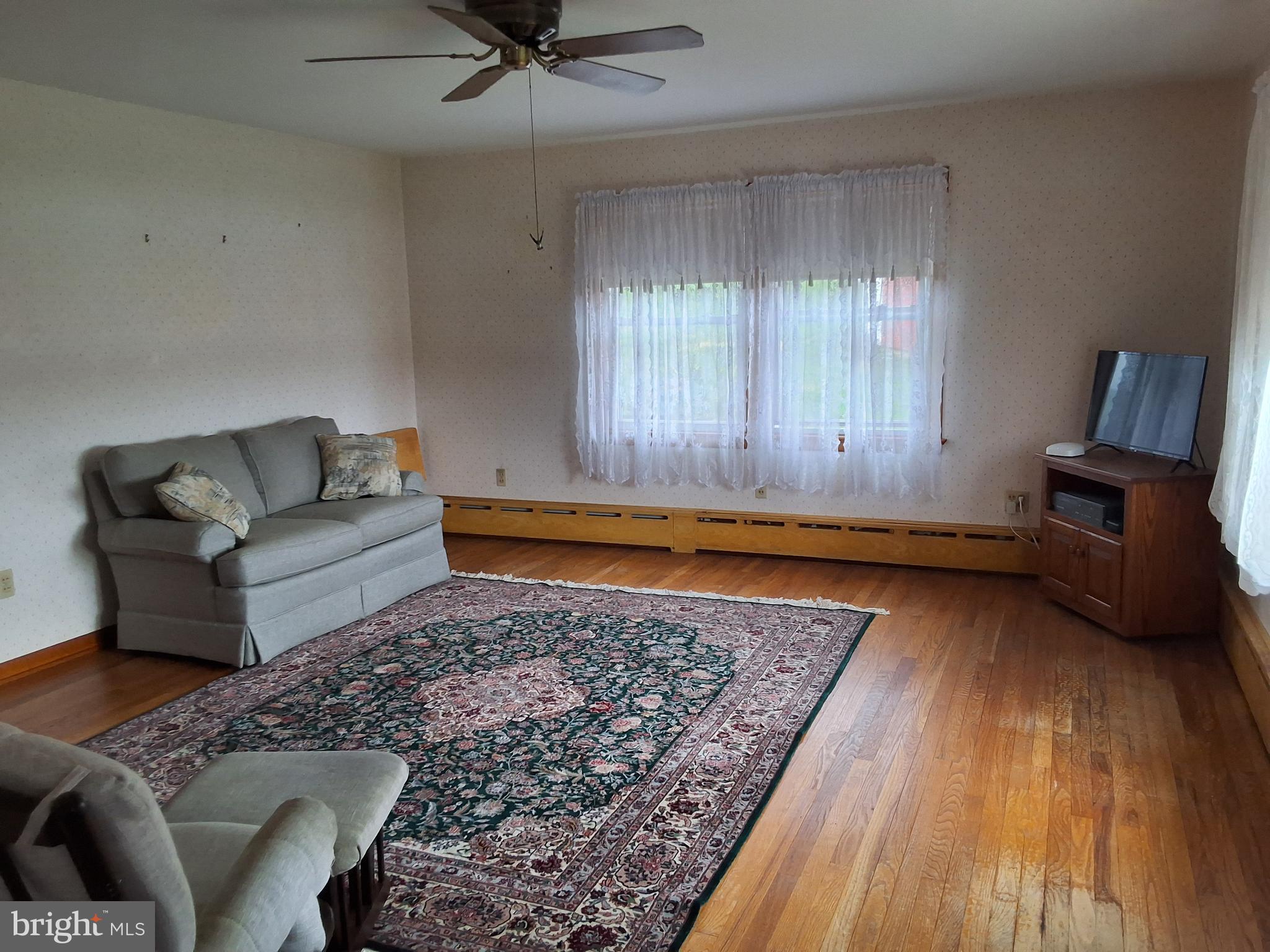 130 Fairland Road Lititz, PA 17543 - Photo 4 of 22 a living room with furniture and a rug