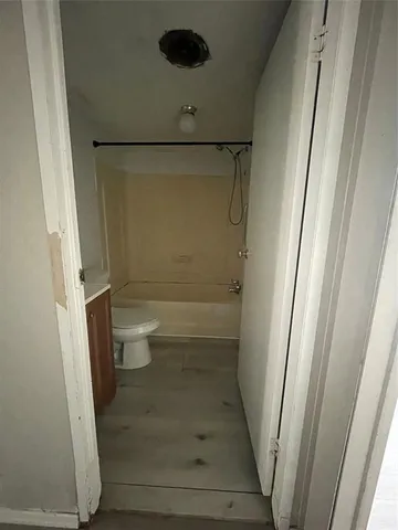 a bathroom with a sink and toilet