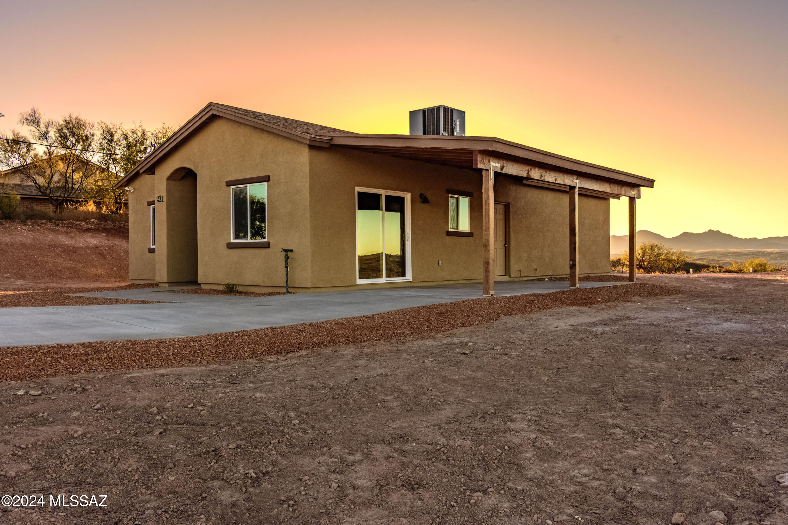 221 Paseo Mascota Rio Rico, AZ 85648 - Photo 41 of 45 a front view of a house with a fence