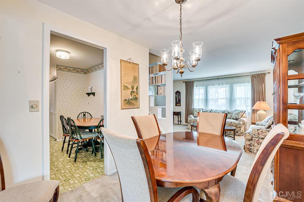 6 Frederick Avenue Colonia, NJ 07067 - Photo 12 of 33 a view of a dining room with furniture window and outside view