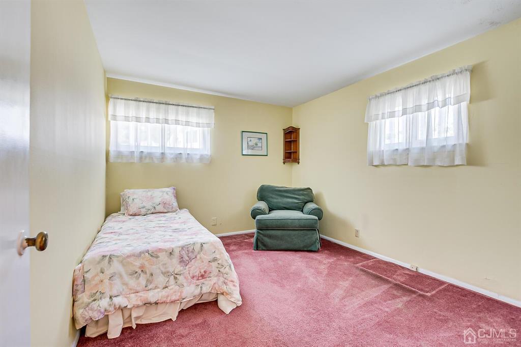 6 Frederick Avenue Colonia, NJ 07067 - Photo 24 of 33 a bedroom with bed and a window