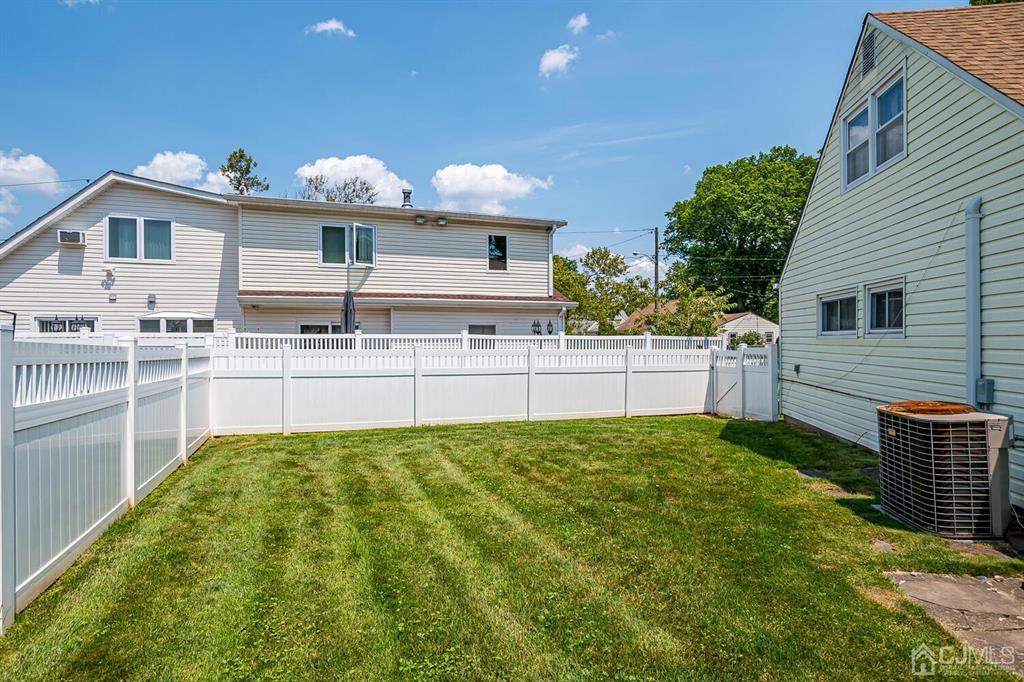 6 Frederick Avenue Colonia, NJ 07067 - Photo 32 of 33 a view of a house with backyard