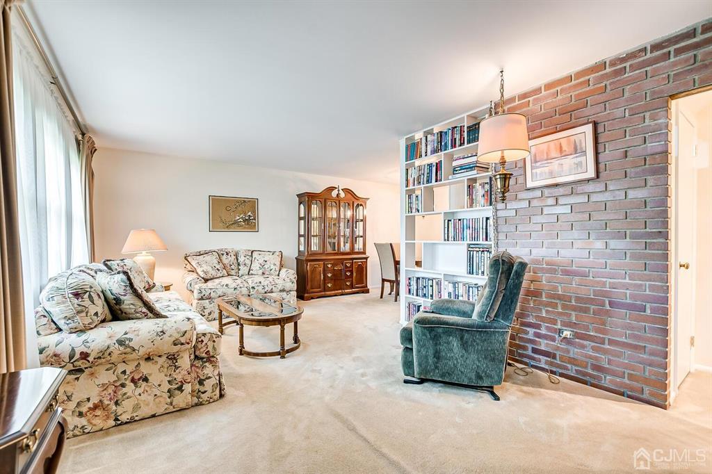 6 Frederick Avenue Colonia, NJ 07067 - Photo 7 of 33 a living room with furniture and a couch