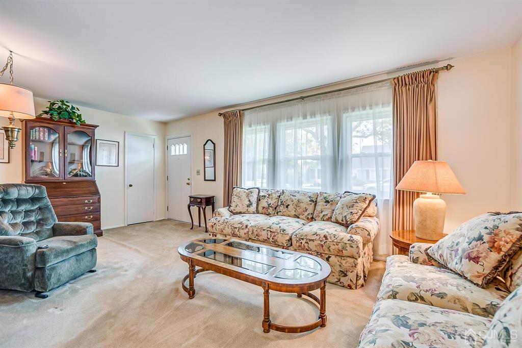6 Frederick Avenue Colonia, NJ 07067 - Photo 9 of 33 a living room with furniture and a window