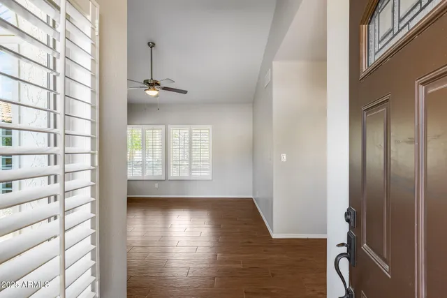 a view of kitchen with furniture and wooden floor