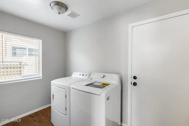 a view of a terrace with a garden and yard