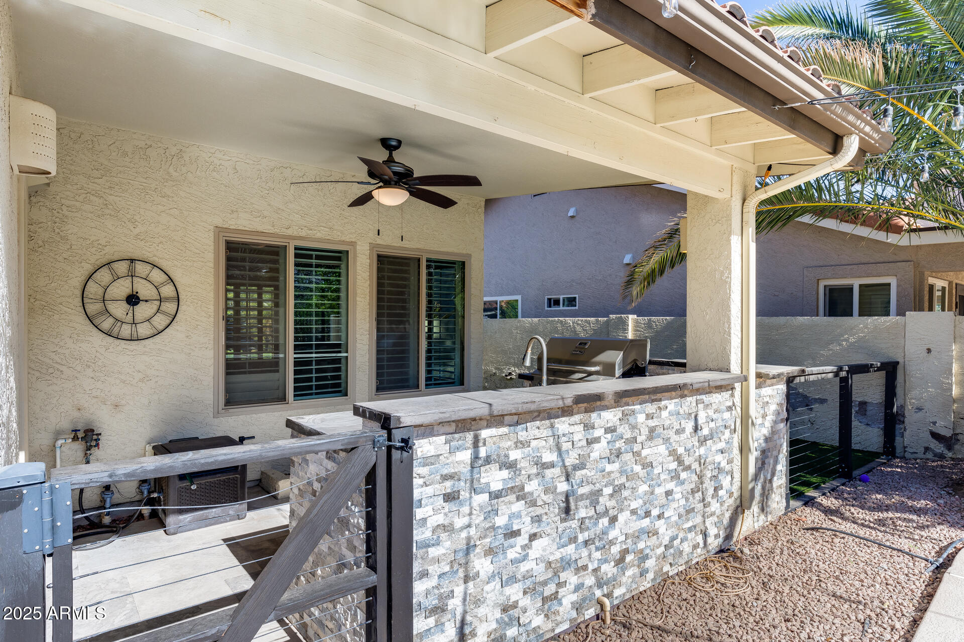 14452 South 40th Street Phoenix, AZ 85044 - Photo 64 of 92 a living room with furniture a table and a large window