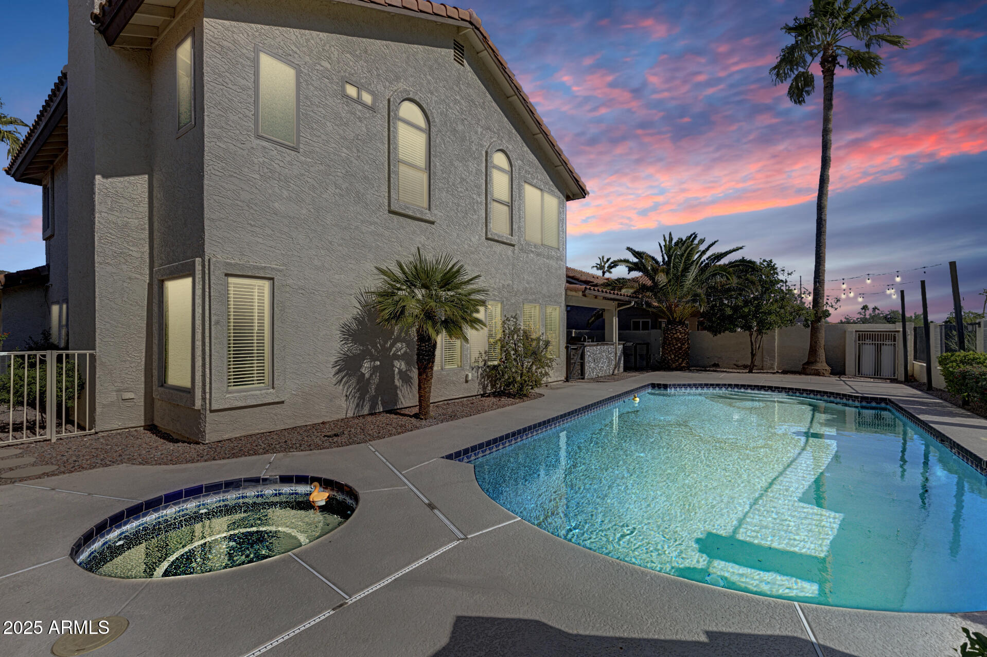 14452 South 40th Street Phoenix, AZ 85044 - Photo 7 of 92 a view of a swimming pool with a patio