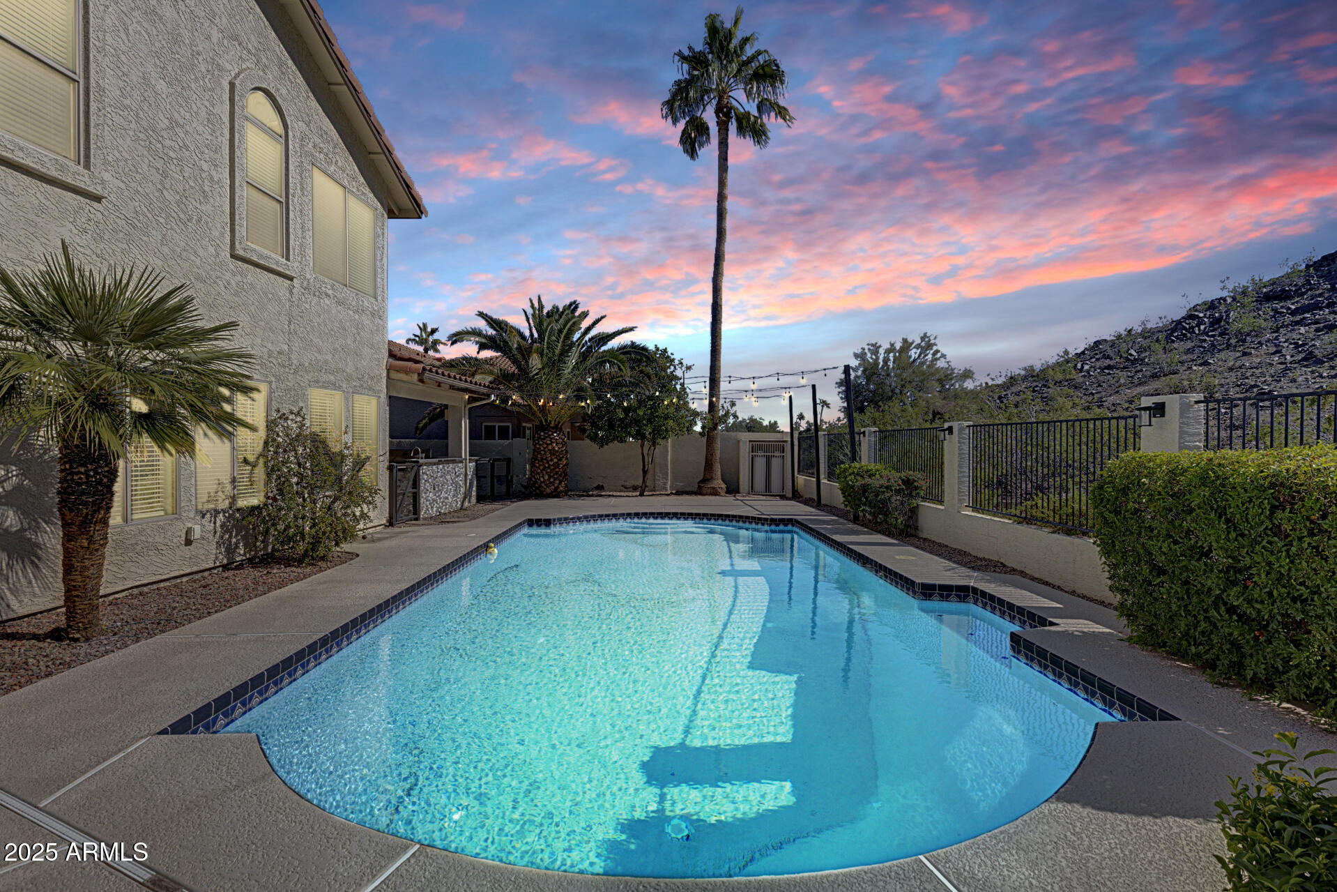 14452 South 40th Street Phoenix, AZ 85044 - Photo 83 of 92 a view of a swimming pool with a patio