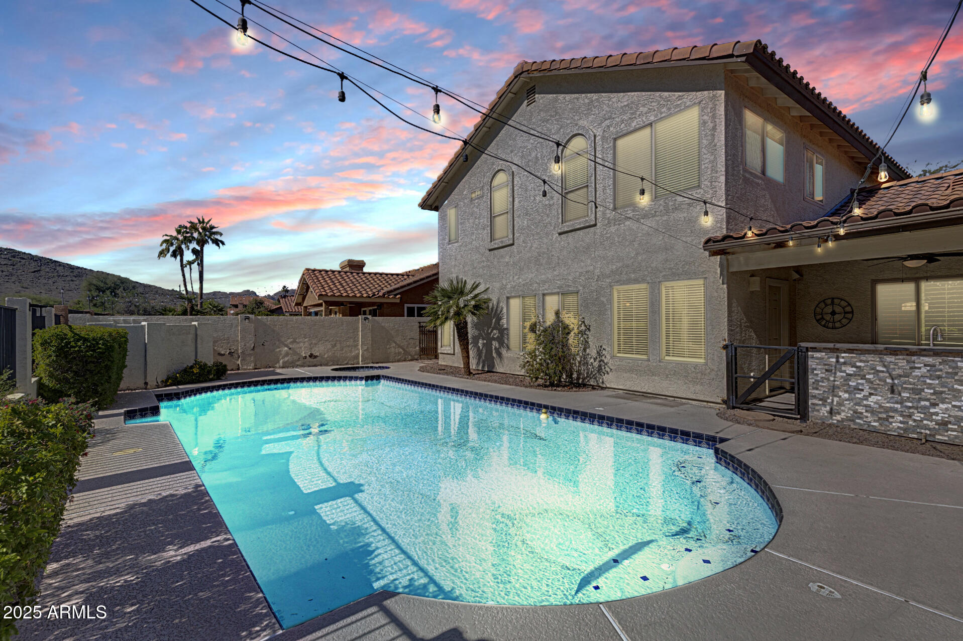 14452 South 40th Street Phoenix, AZ 85044 - Photo 85 of 92 a view of a swimming pool with a patio