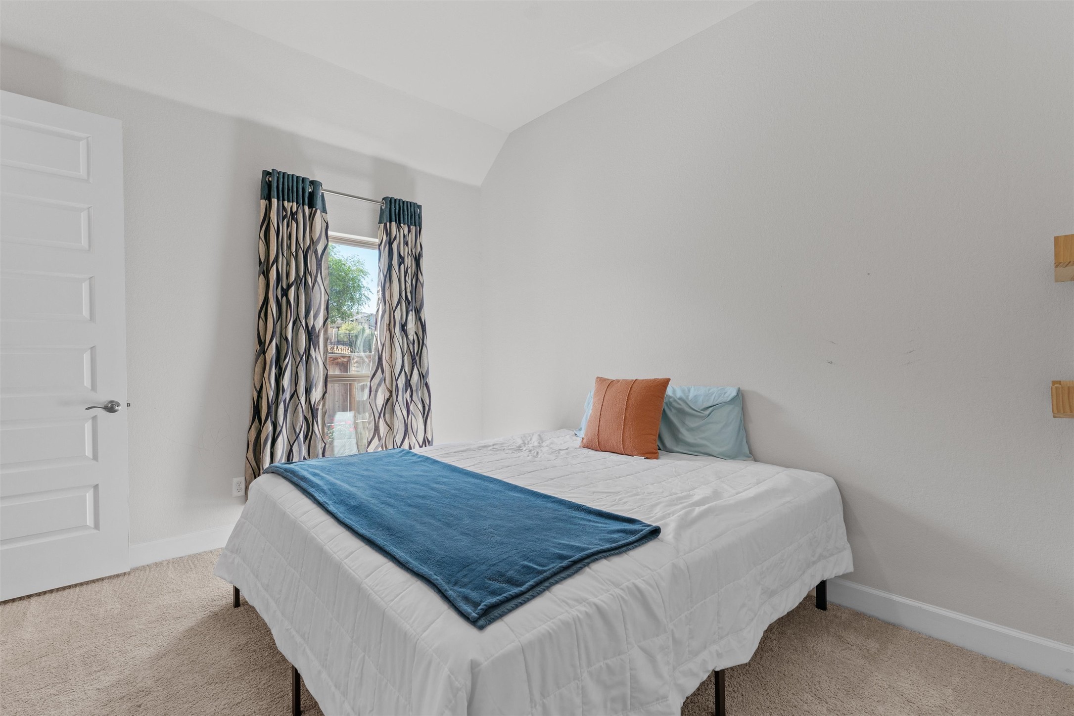 101 Pienza Drive Georgetown, TX 78628 - Photo 28 of 40 a bedroom with a bed and wooden floor