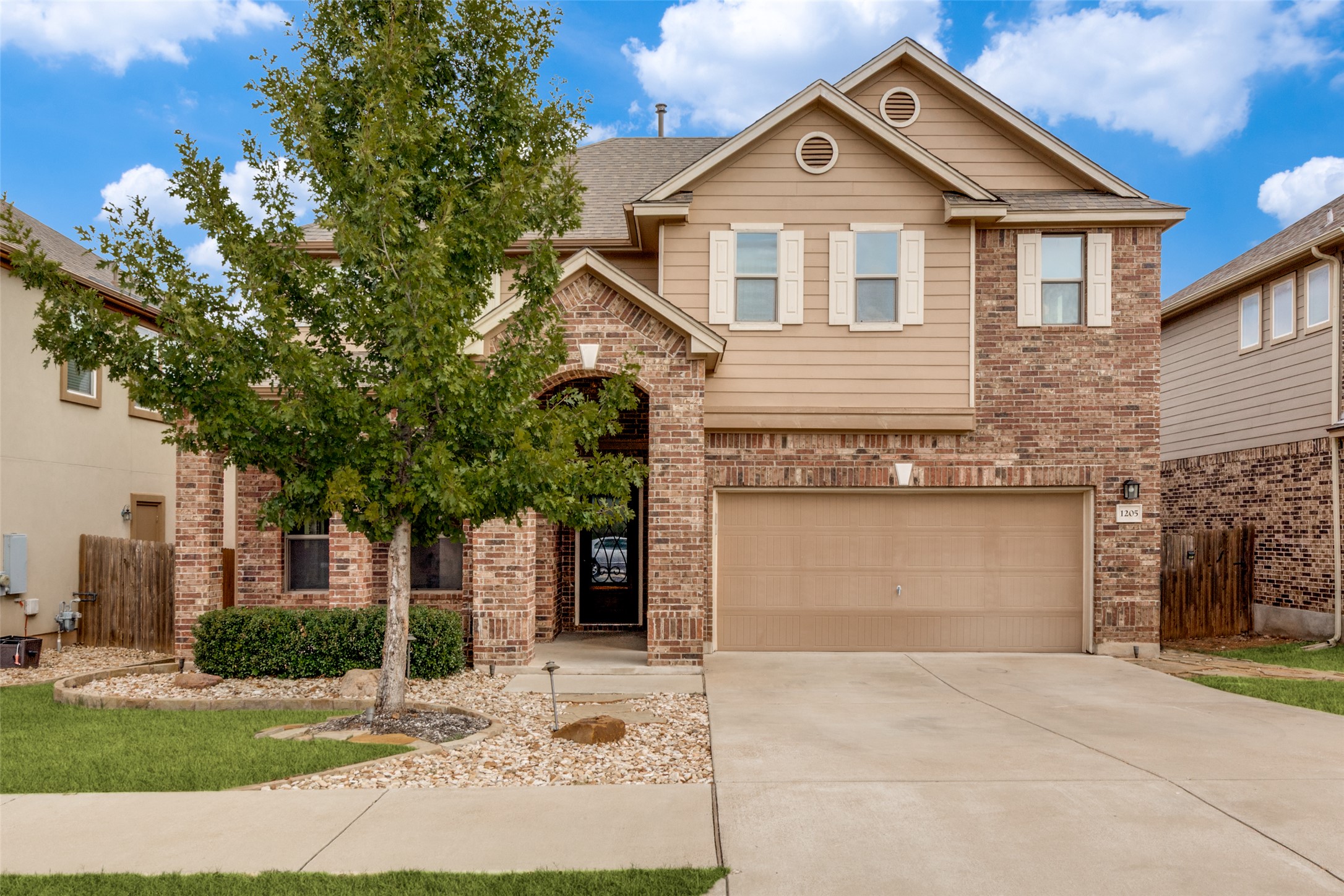 1205 Half Hitch Trail Georgetown, TX 78633 - Photo 1 of 12 a front view of a house with a yard and garage