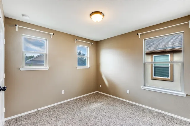 an empty room with a workbench
