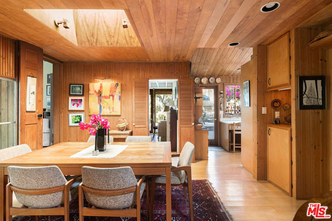 537 West Rustic Road Santa Monica, CA 90402 - Photo 4 of 22 a view of a dining room with furniture