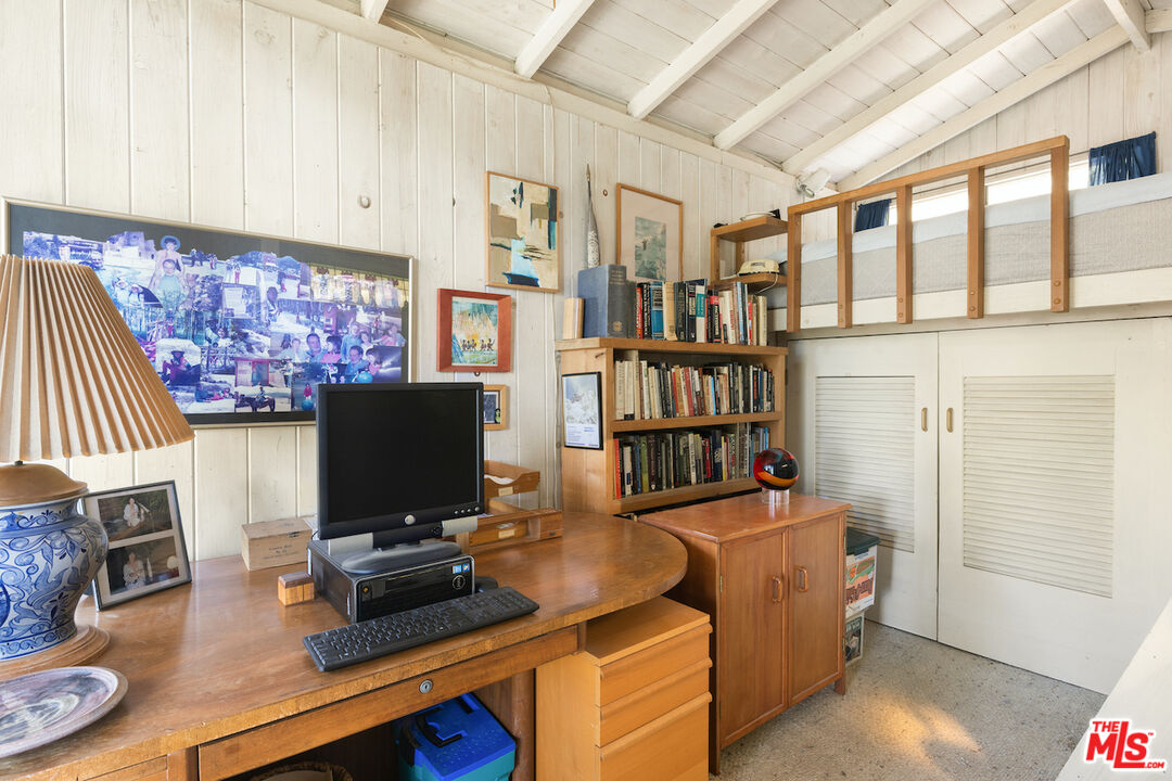 537 West Rustic Road Santa Monica, CA 90402 - Photo 10 of 22 a view of a workspace with furniture and a fireplace
