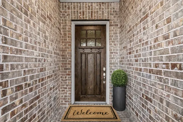 a view of a door and chair