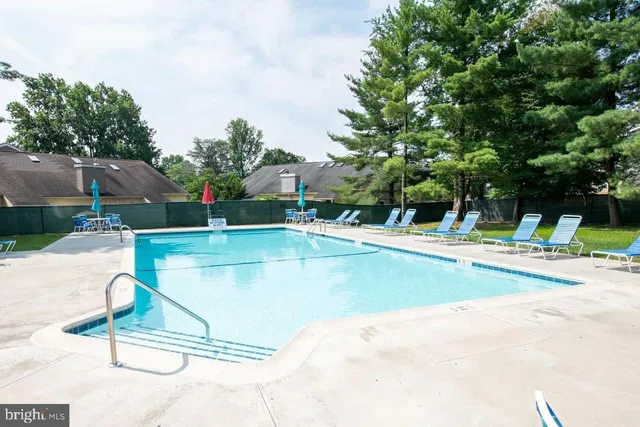 a view of park with benches