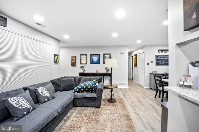 a living room with furniture and a couch