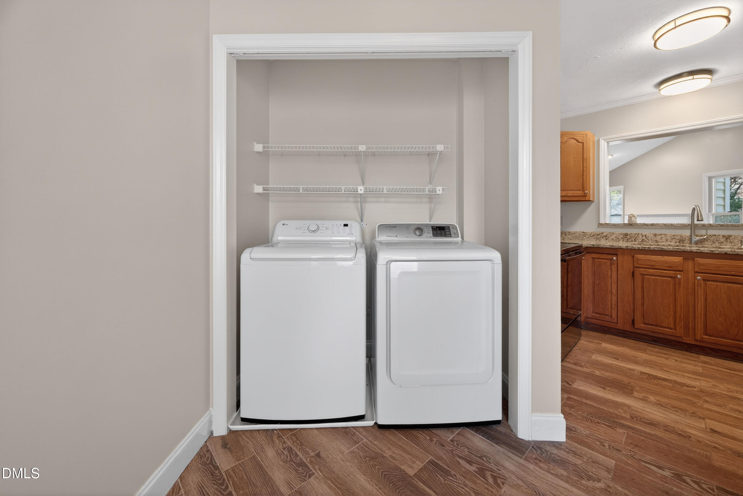 109 Linville River Road Cary, NC 27511 - Photo 10 of 41 a view of a storage & utility room with washer and dryer