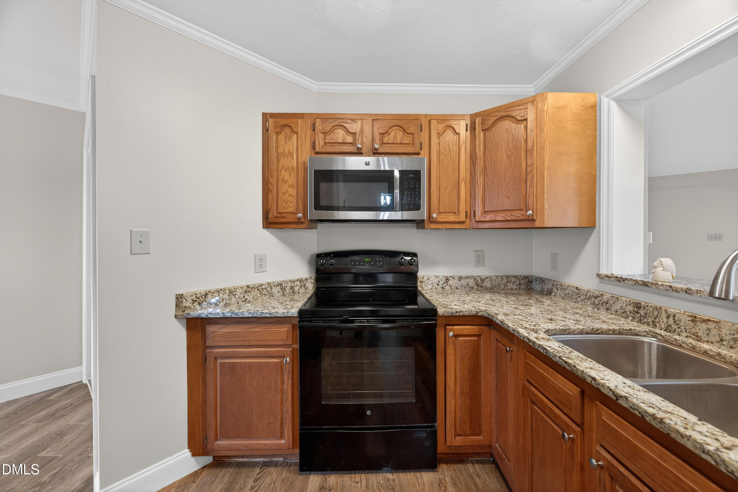 109 Linville River Road Cary, NC 27511 - Photo 11 of 41 a kitchen with a stove and a microwave