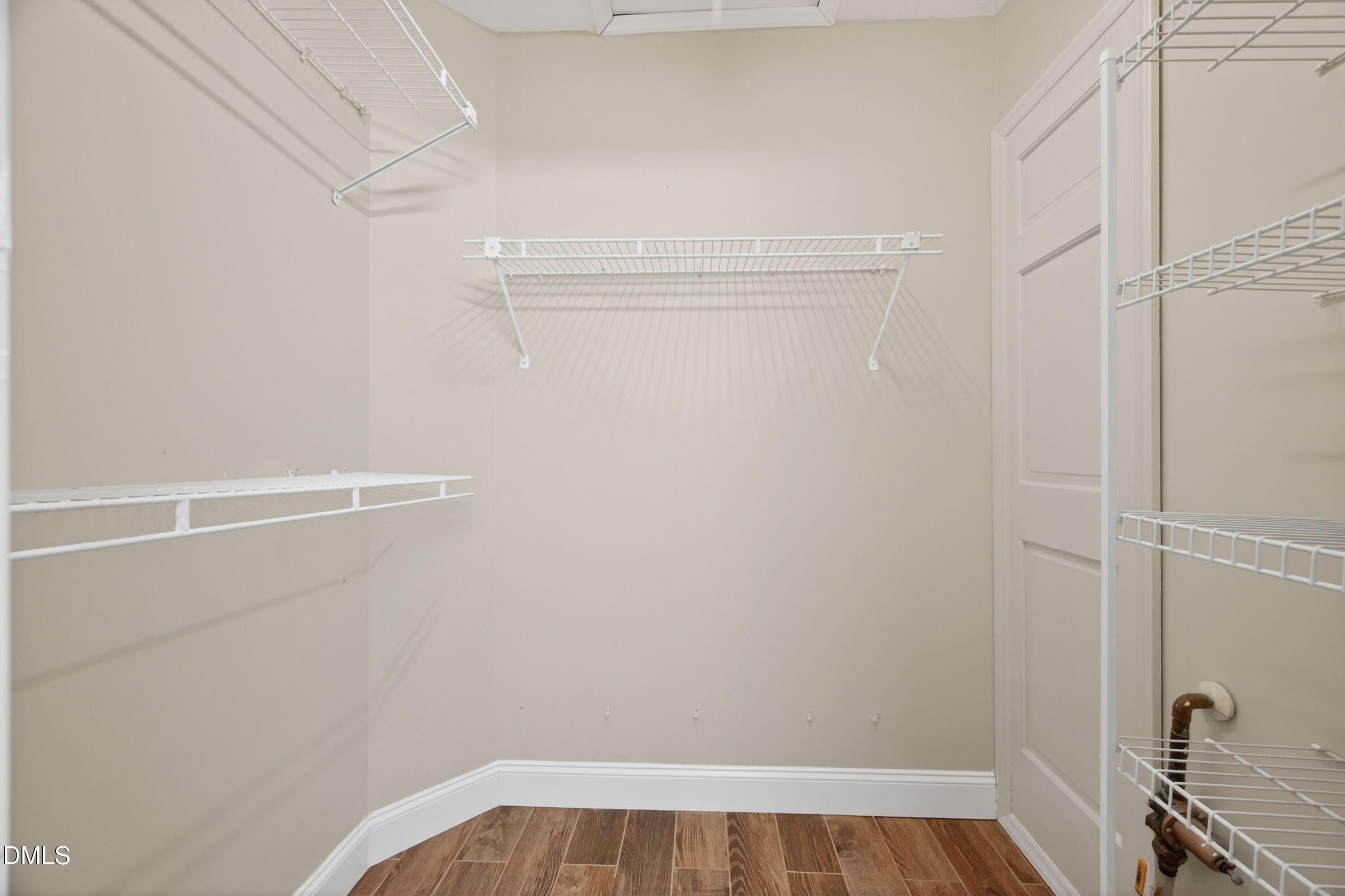 109 Linville River Road Cary, NC 27511 - Photo 26 of 41 a view of a room with racks on the wall