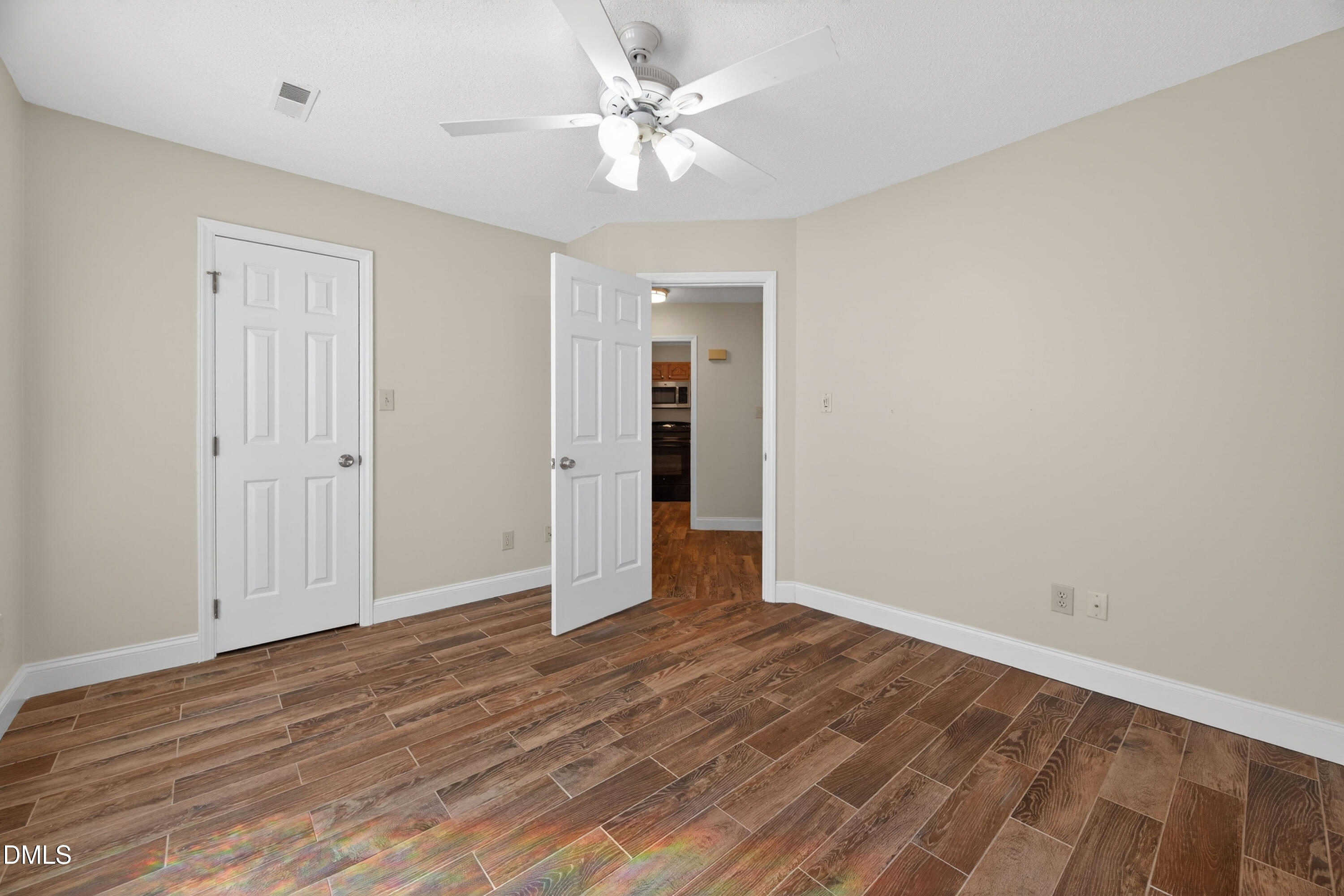 109 Linville River Road Cary, NC 27511 - Photo 27 of 41 wooden floor in an empty room with a window