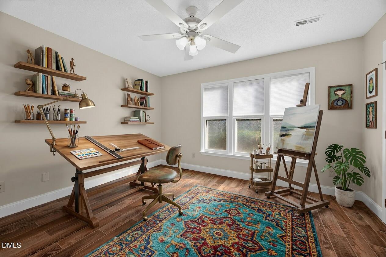 109 Linville River Road Cary, NC 27511 - Photo 29 of 41 a living room with furniture and a window