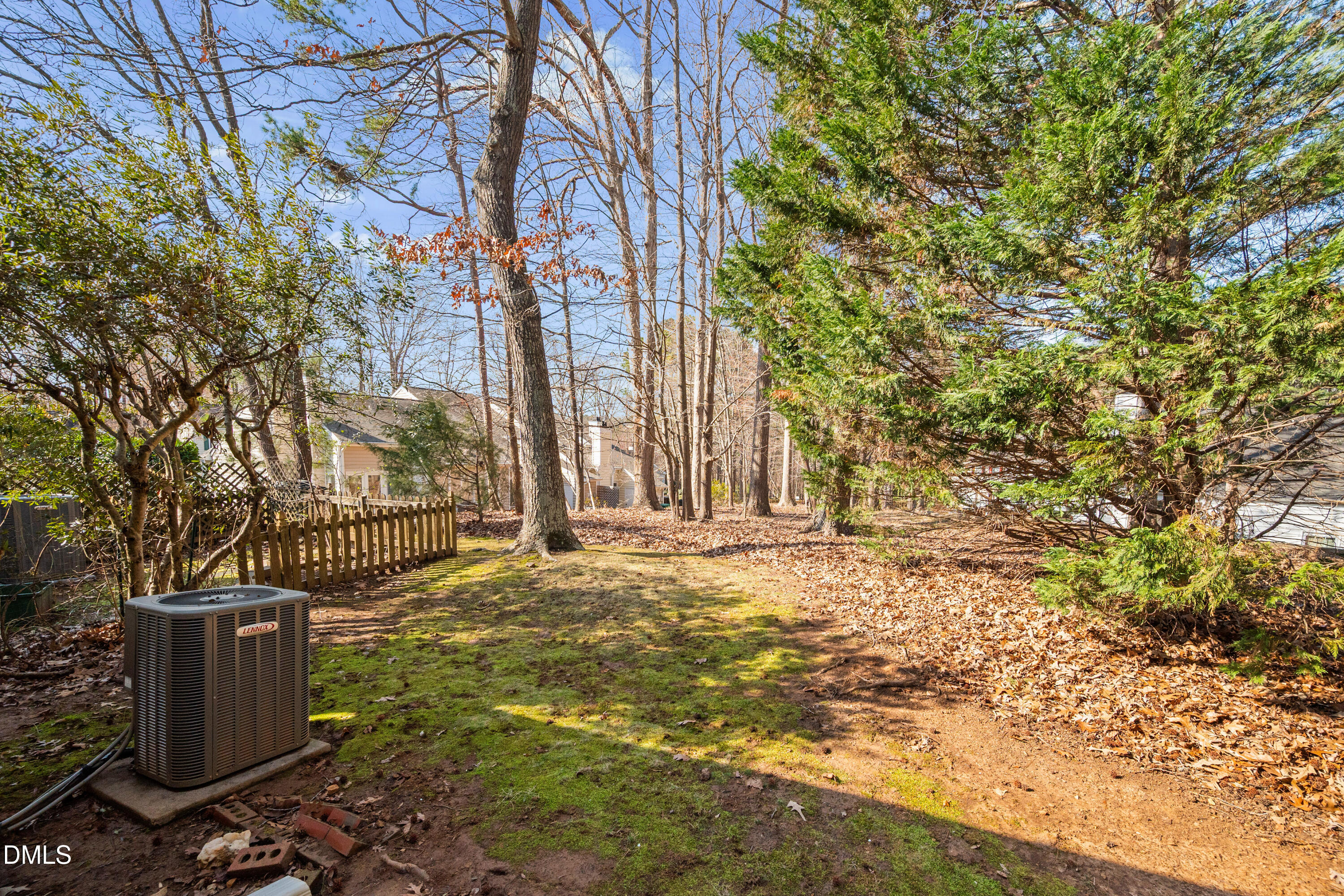 109 Linville River Road Cary, NC 27511 - Photo 36 of 41 a view of a yard with brick wall