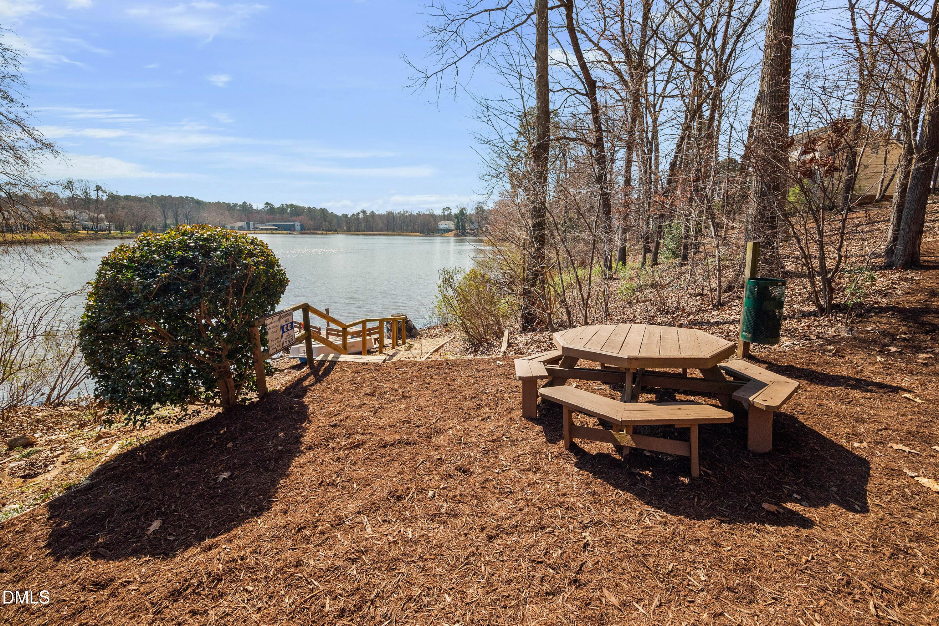 109 Linville River Road Cary, NC 27511 - Photo 38 of 41 a view of a lake with a mountain