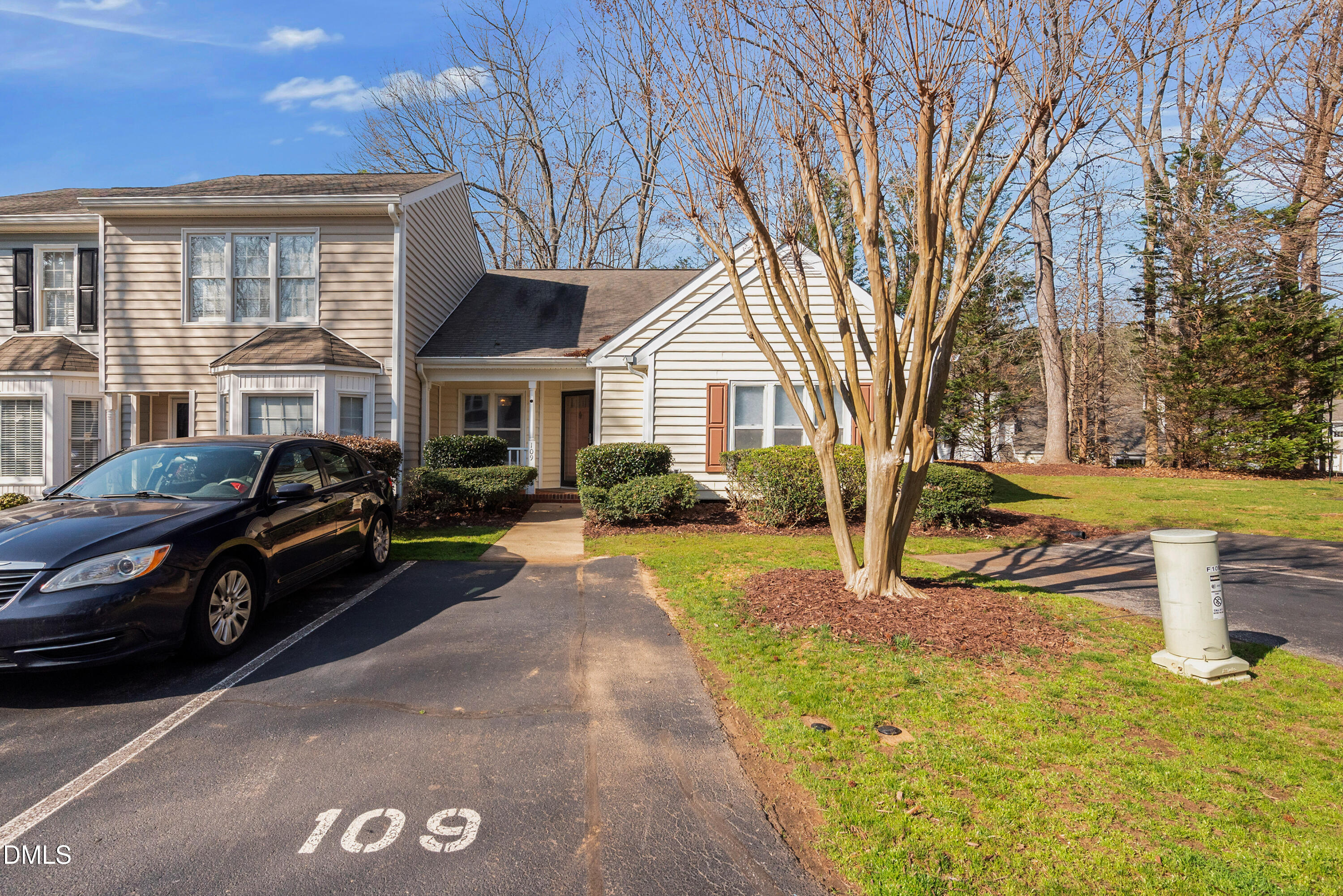 109 Linville River Road Cary, NC 27511 - Photo 4 of 41 a view of a street with cars parked in front of house