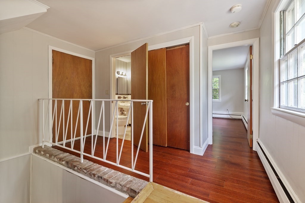 254 Edgell Road Framingham, MA 01701 - Photo 14 of 42 a view of an entryway with wooden floor