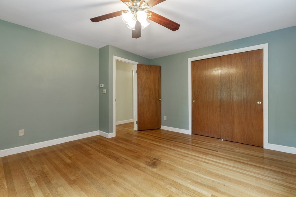 254 Edgell Road Framingham, MA 01701 - Photo 19 of 42 a view of an empty room and wooden floor