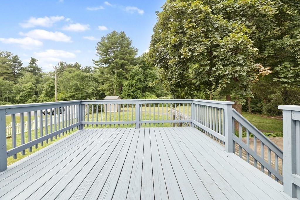 254 Edgell Road Framingham, MA 01701 - Photo 27 of 42 a view of deck with wooden floor and fence