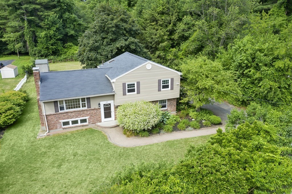 254 Edgell Road Framingham, MA 01701 - Photo 3 of 42 an aerial view of a house with a yard